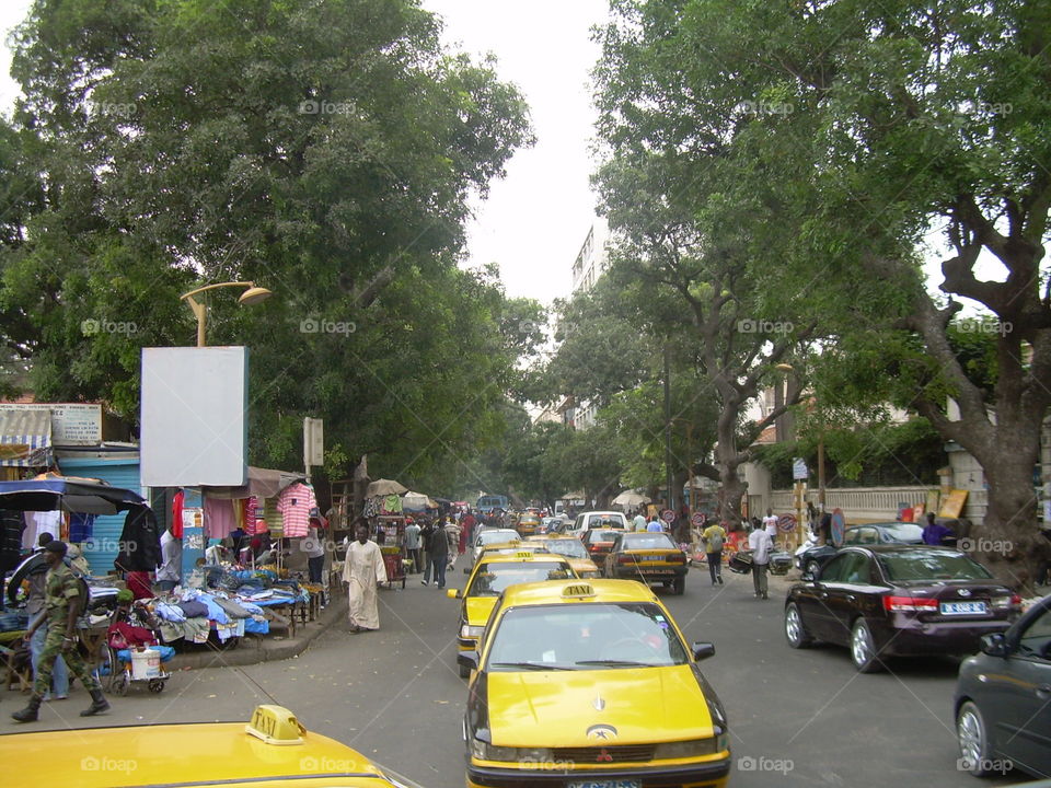 Busy street in Dakar . Photo taken in Dakar around 2007. 