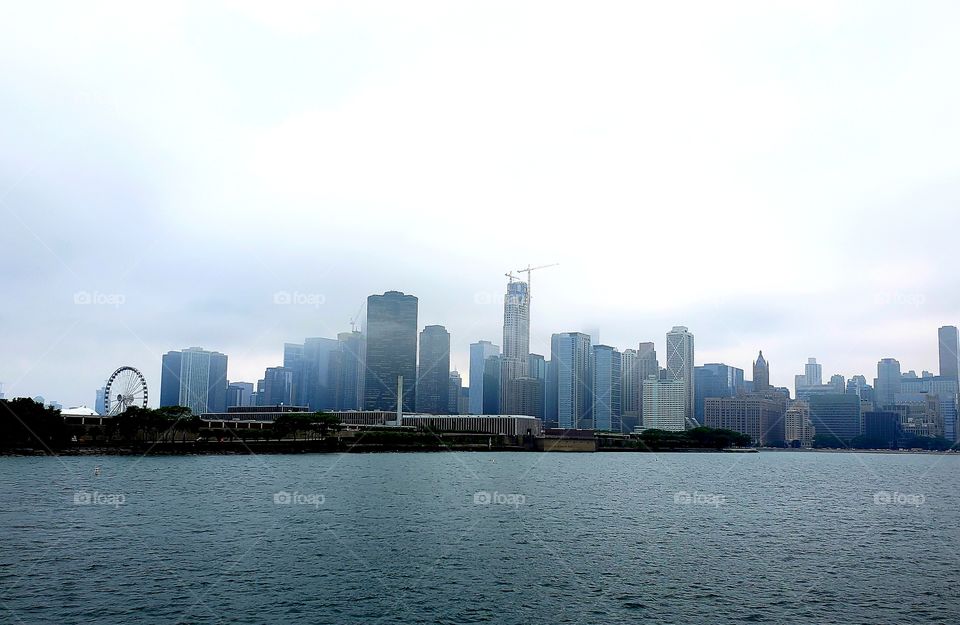View of foggy downtown Chicago from Lake Michigan