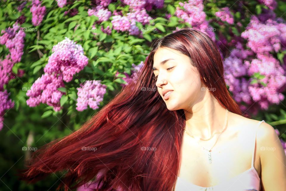 Young woman with  red long hair