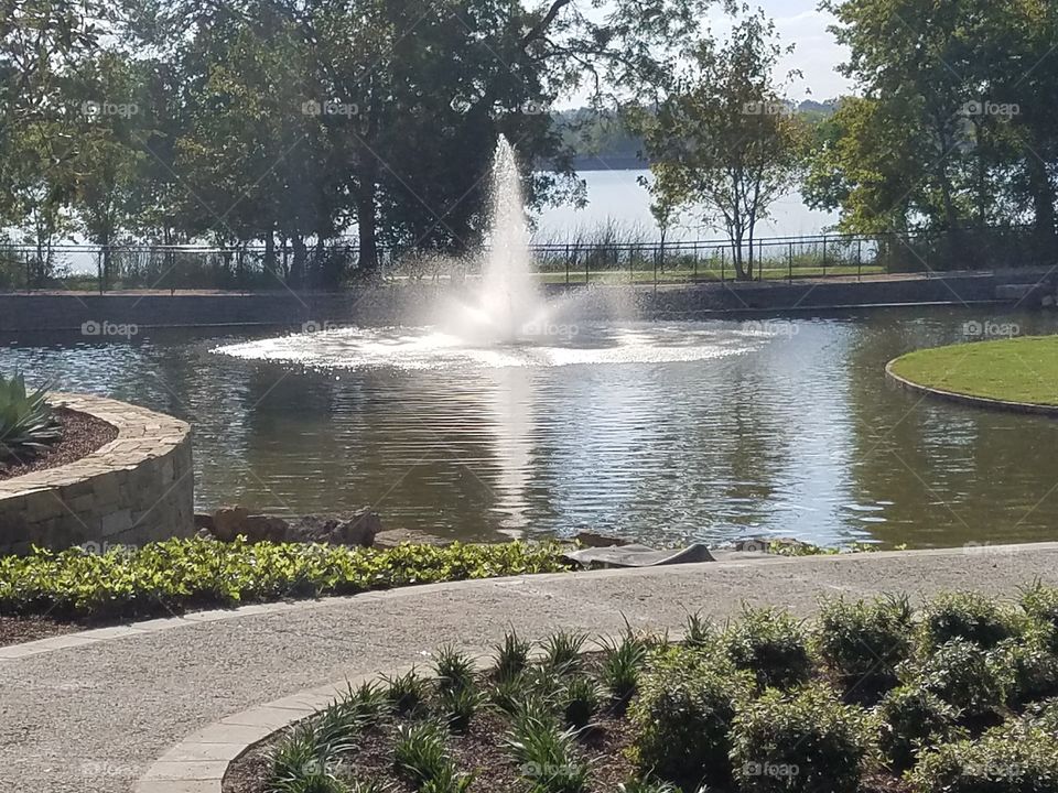 Fountain next to lake