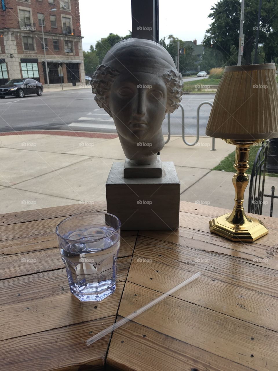 Coffee shop had a classical bust. 