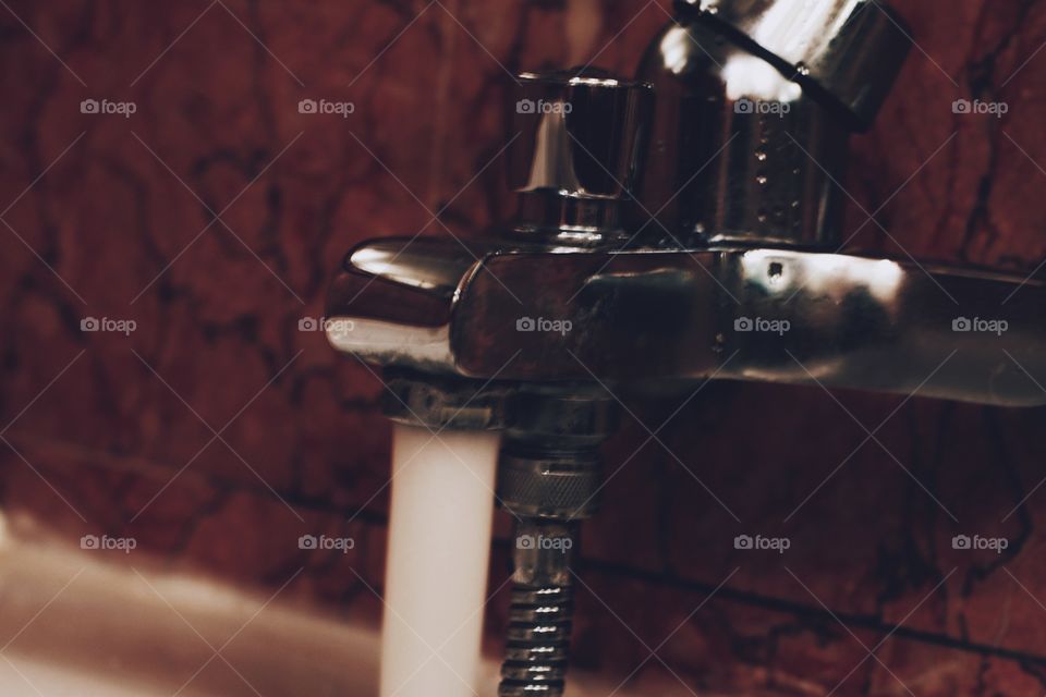 Water tap in the bath tub 