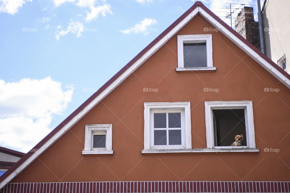 Facade of a European house against the blue sky