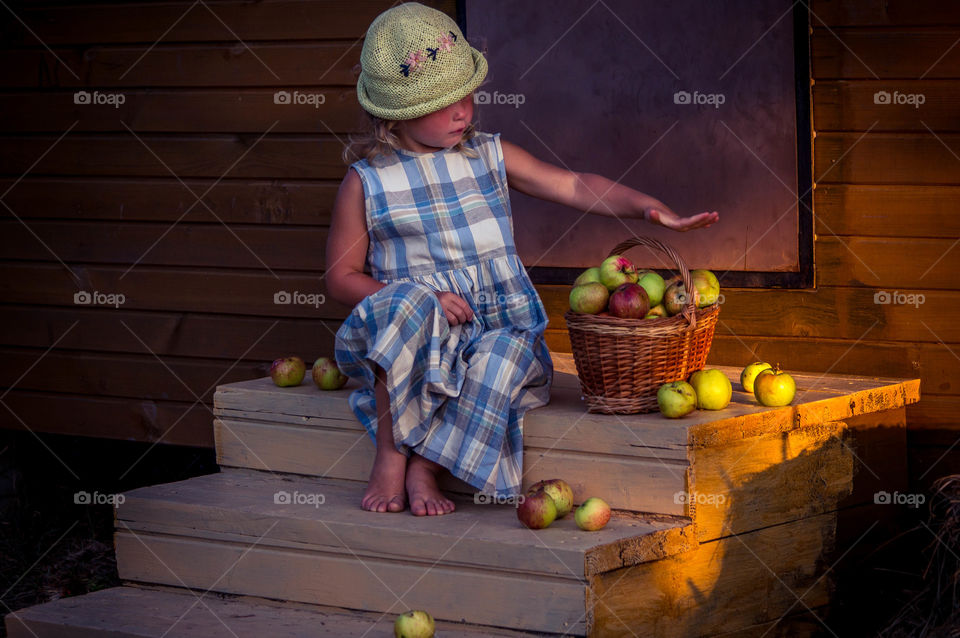 girl with basket of apples
