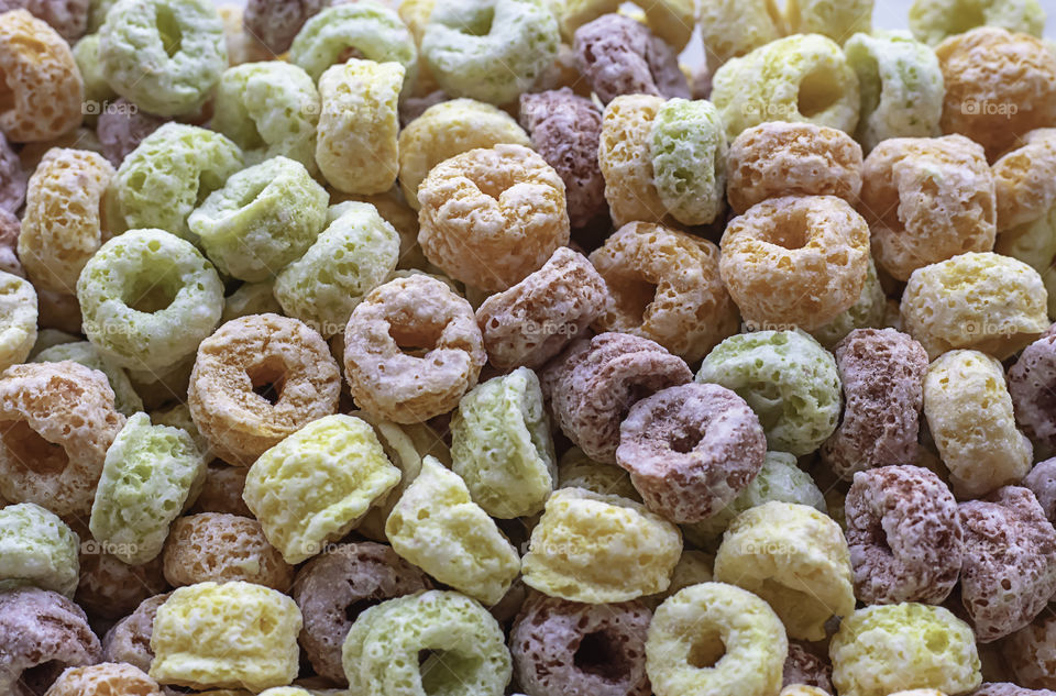 Food cereal made from corn starch a variety of colors.