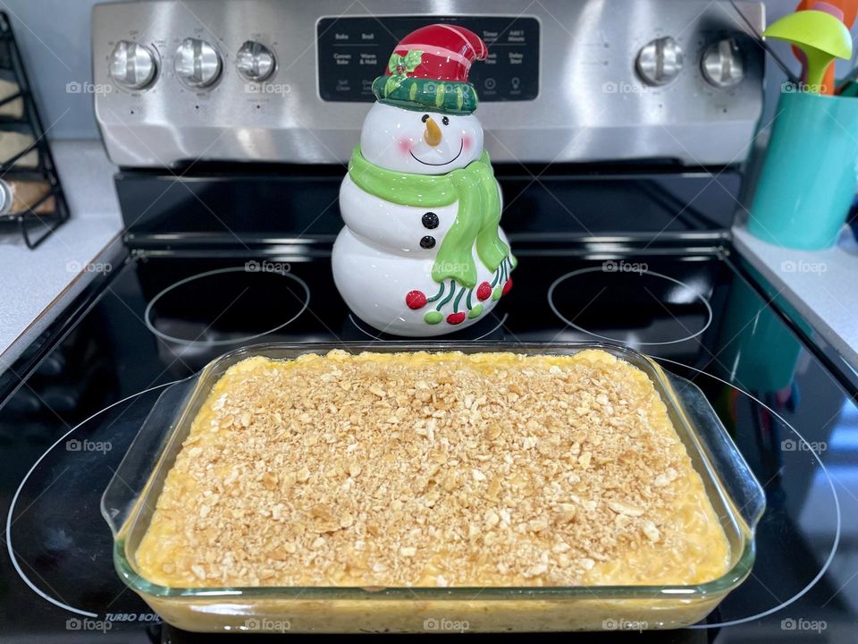 Baking homemade Mac and cheese, Mac and cheese from a recipe in a cookbook, cooking from scratch