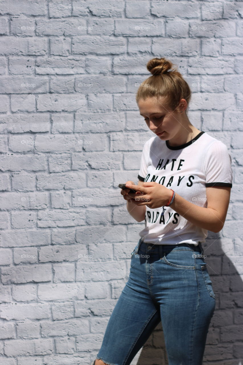 Young woman using mobile phone