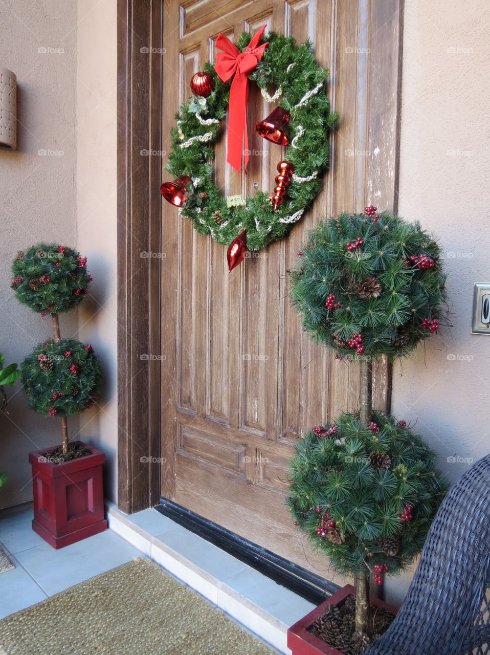 Christmas wreath and topiaries.