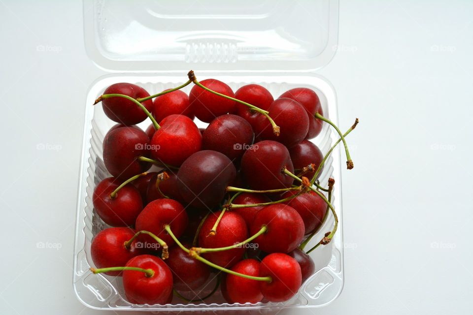 red cherry summer food white background