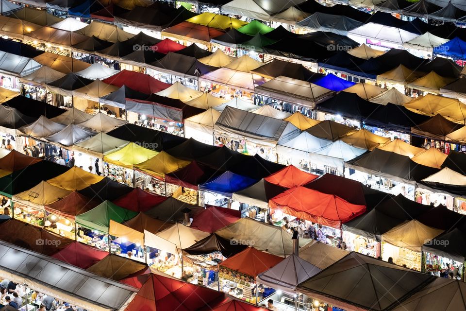 Summer is colorful time to go out all day celebrate , Many tourists are enjoying at The famous Thai night flea market , Ratchada market