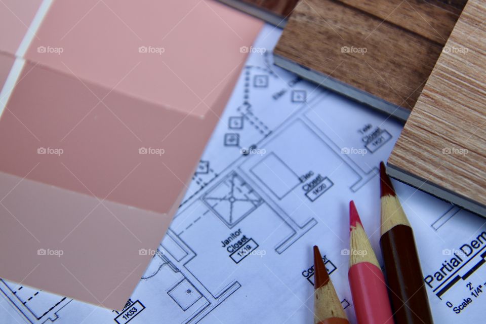 Blue prints with color palate paint and flooring samples