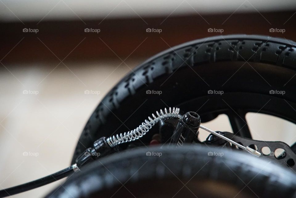 The smallest spring on a leg scooter