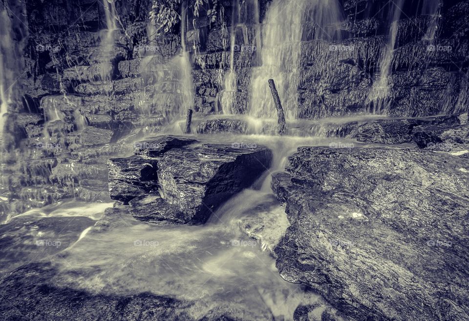 Rock wall waterfall in black and white
