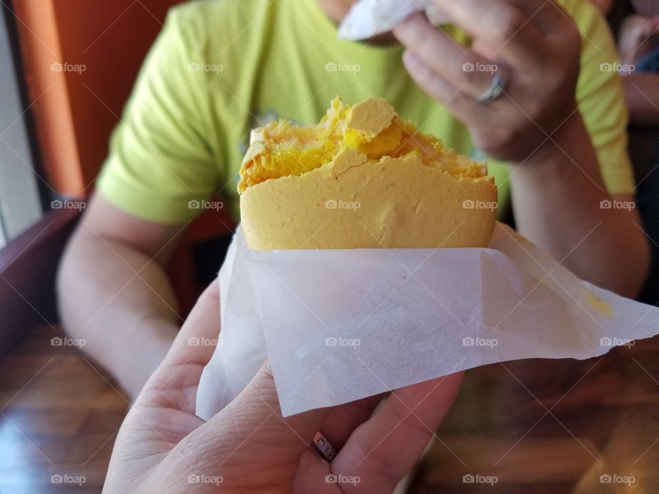 Enjoying macaroons ice cream