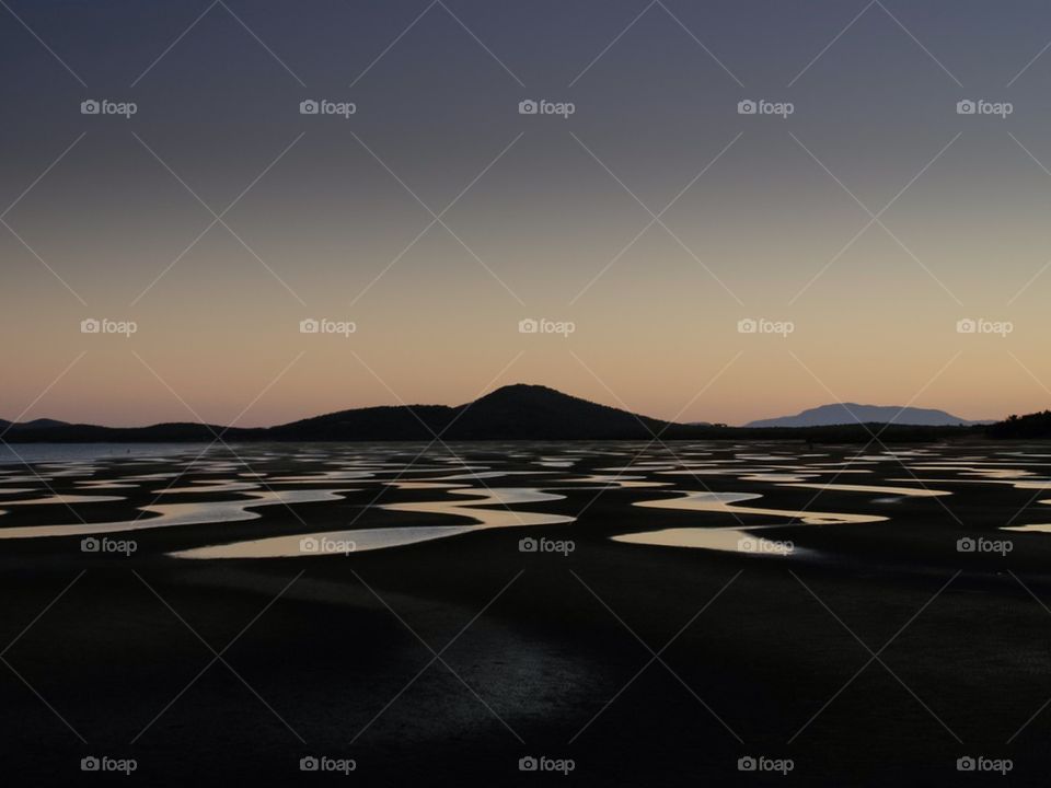 View of mountain range at dusk