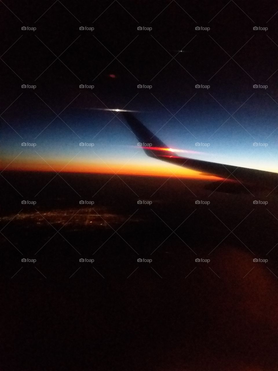 Plane Wing and Sunset