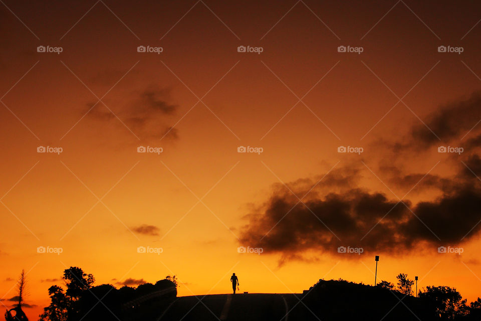 Silhouette of a person far away