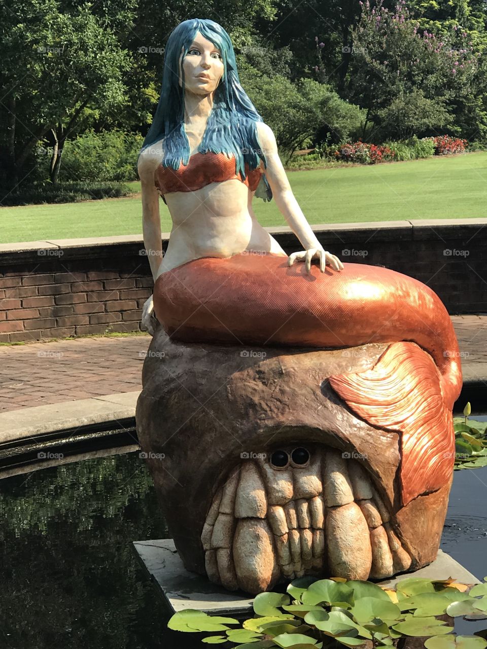 Mermaid statue mythical creature swim water wet