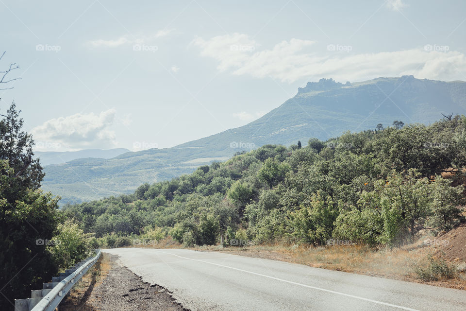 Car trip. Road through mountains in Crimea