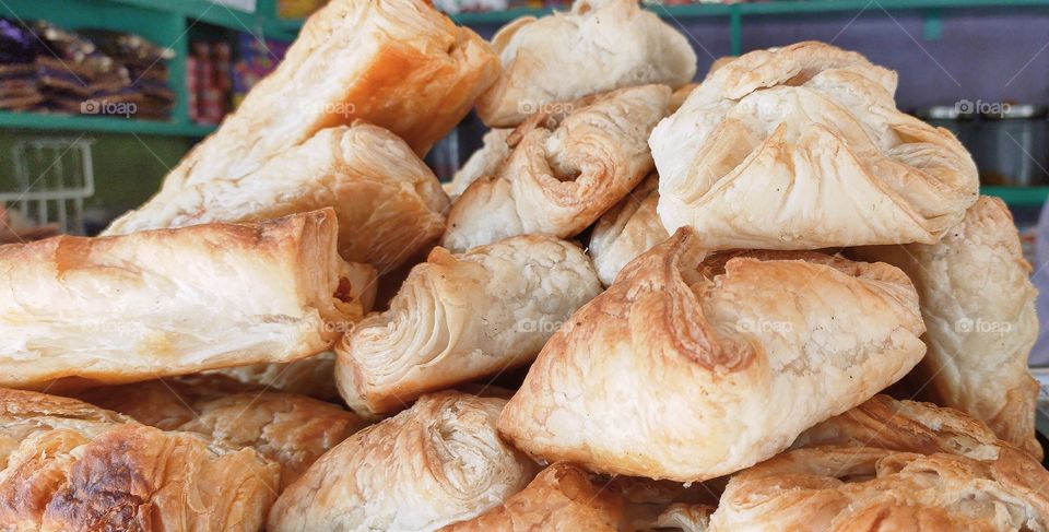 Hot Curry puff is a dish of youth choice