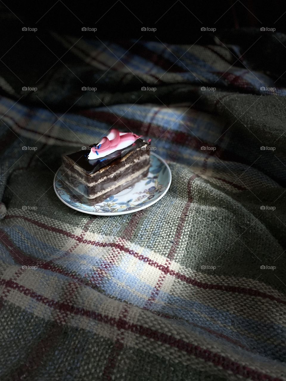 Delicious chocolate cake with raspberry cream 