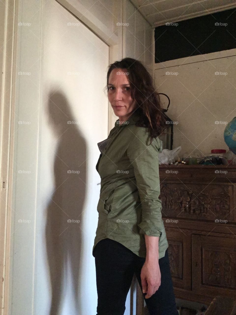 Woman take a pose home 