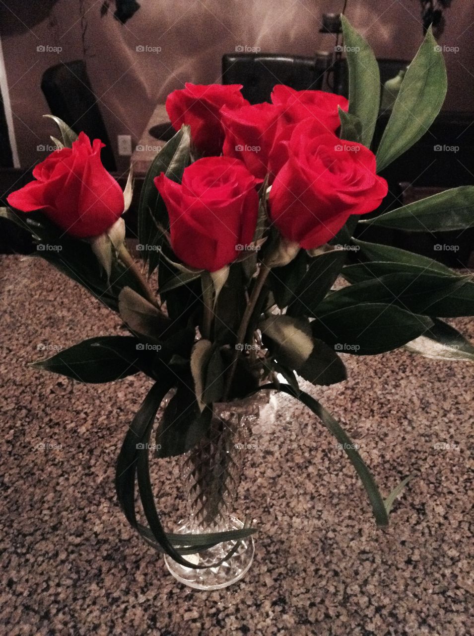 Vase full of roses
