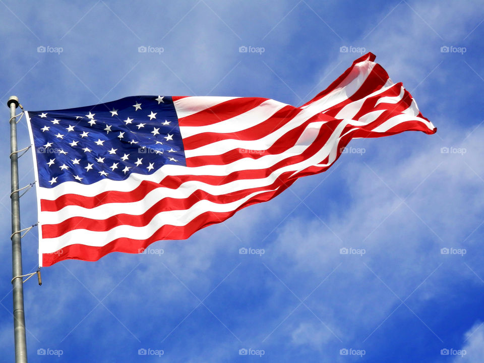American Flag blows in the wind. 