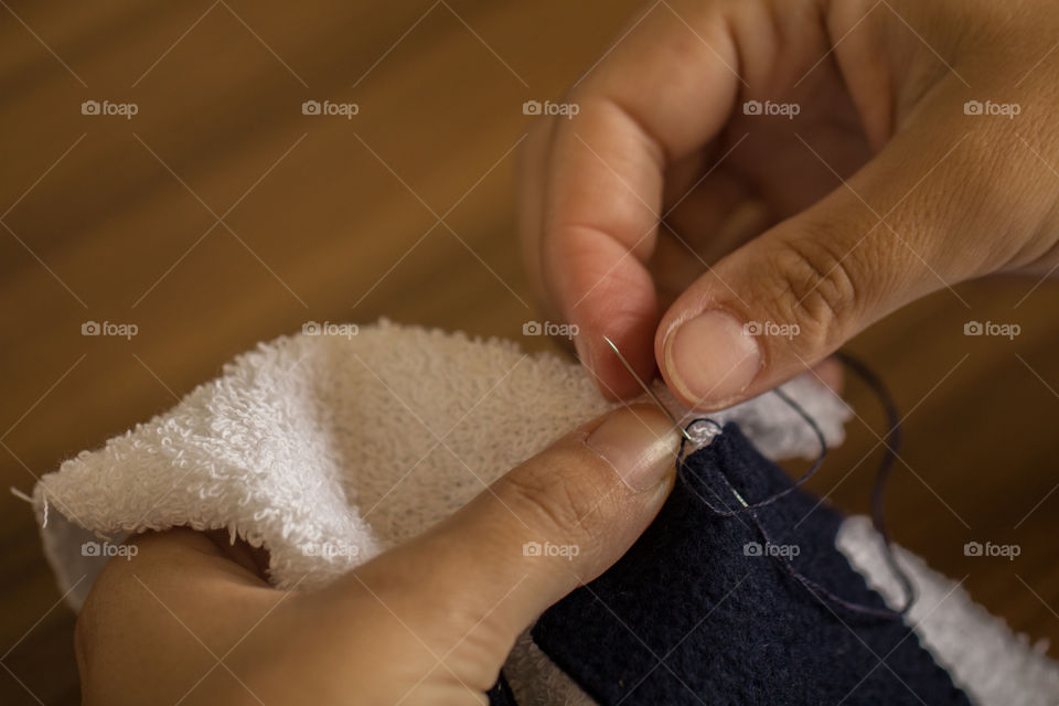 Sewing with needle and thread