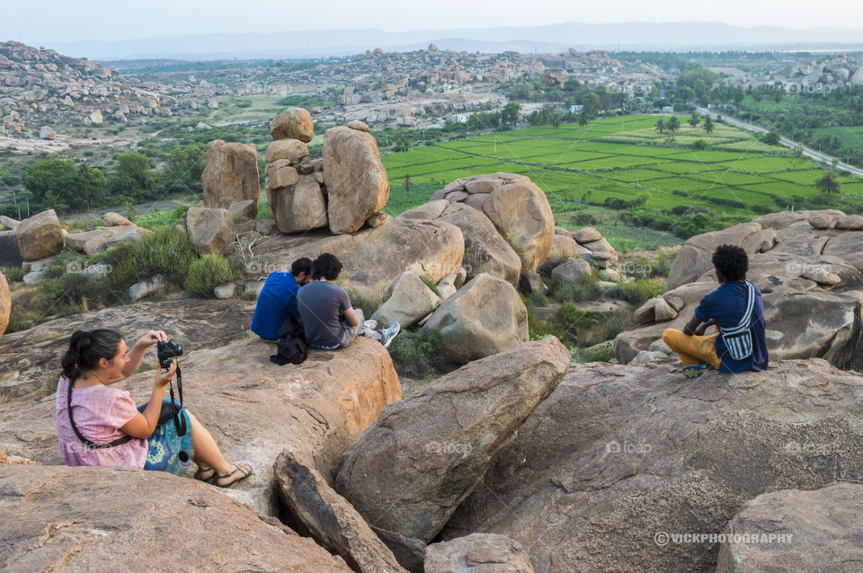 People Having Fun Taking Pictures Helping Each Other