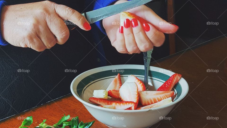 Chopping fruit 