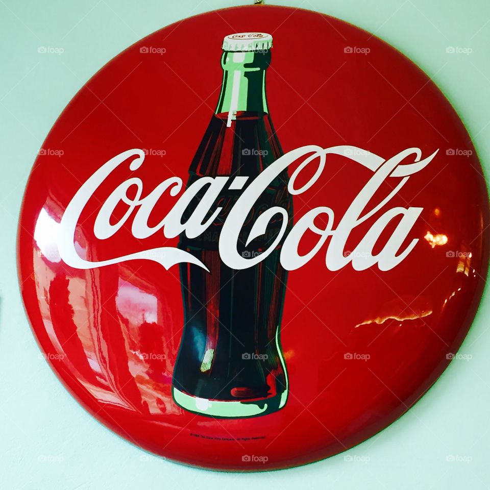 An original Coca-Cola Ad from a still functioning 1950’s malt shop diner. 