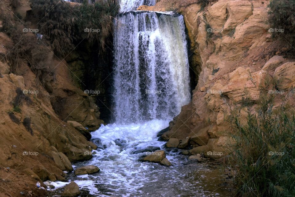 Waterfall through rocks