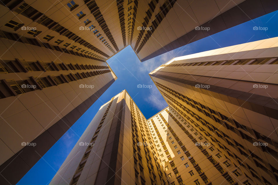 the beauty of city buildings seen from the bottom up forms a pattern