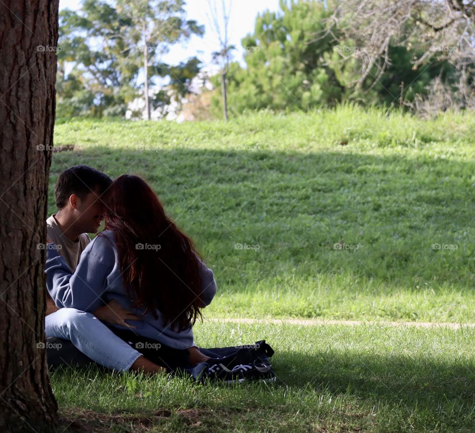 Hugging couple in the park