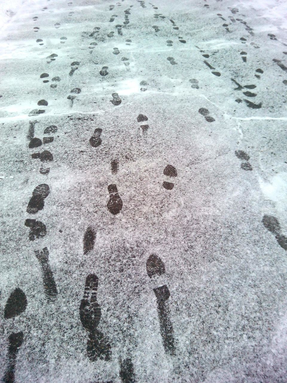 footprints in the snow beautiful texture view from the ground