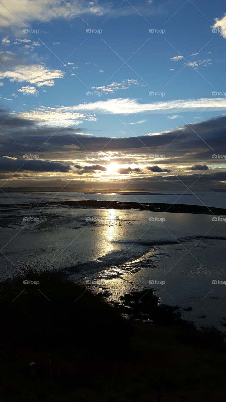 Reflection of sunrise at sea