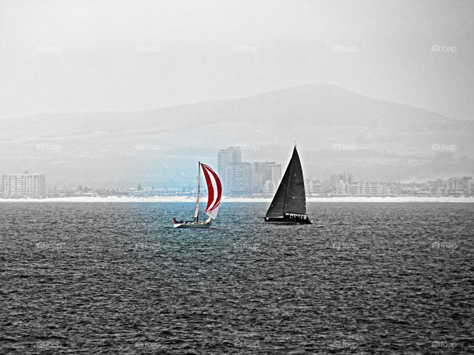 two yachts passing in the Bay