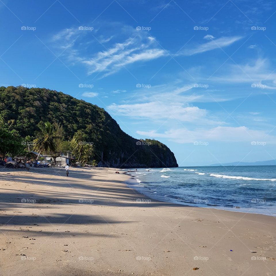 Scenic view of beach against sky
