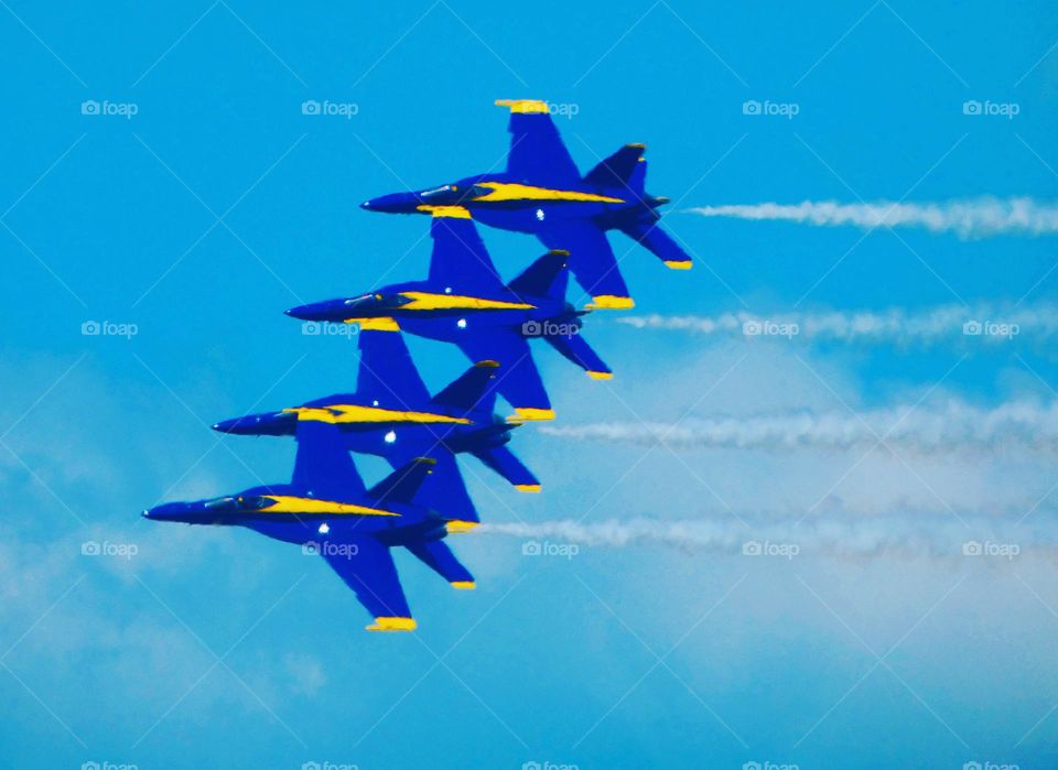 Blue Angels fast fighter jets in flight at an air show demonstration in Florida