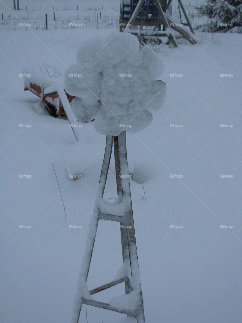 windmill covered in snow
