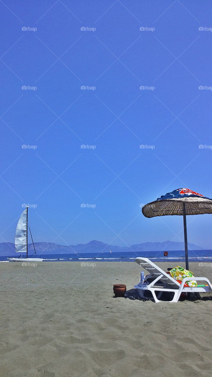 beach and sailboat. sarigerme plaji