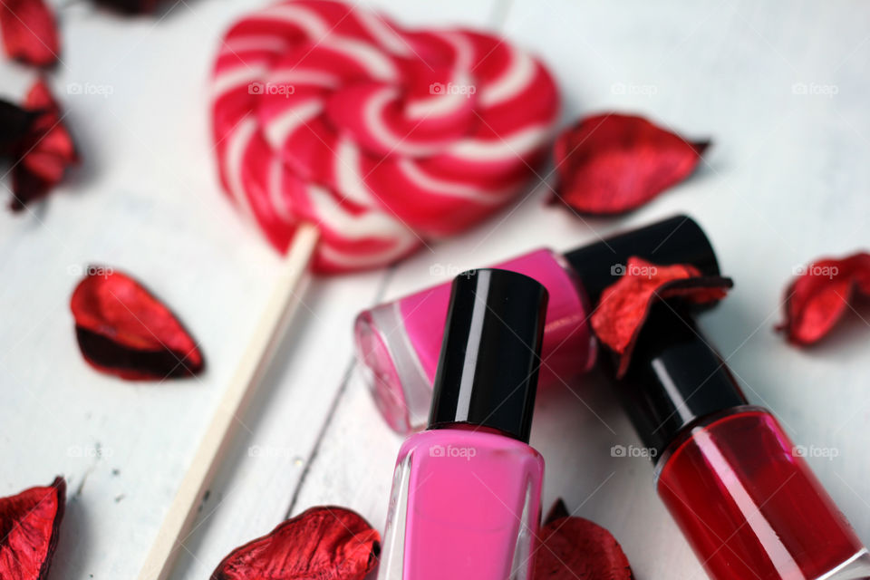 Beauty, health, spa and personal care: nail polish, flowers, rose petals, sweet