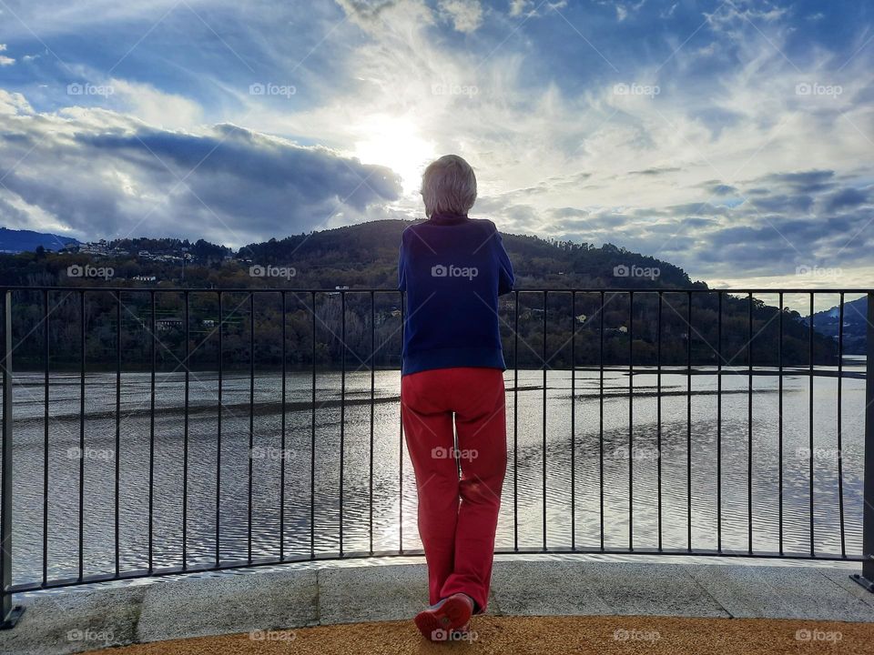 Woman looking at the Douro River, Pala, Baião, Portugal
