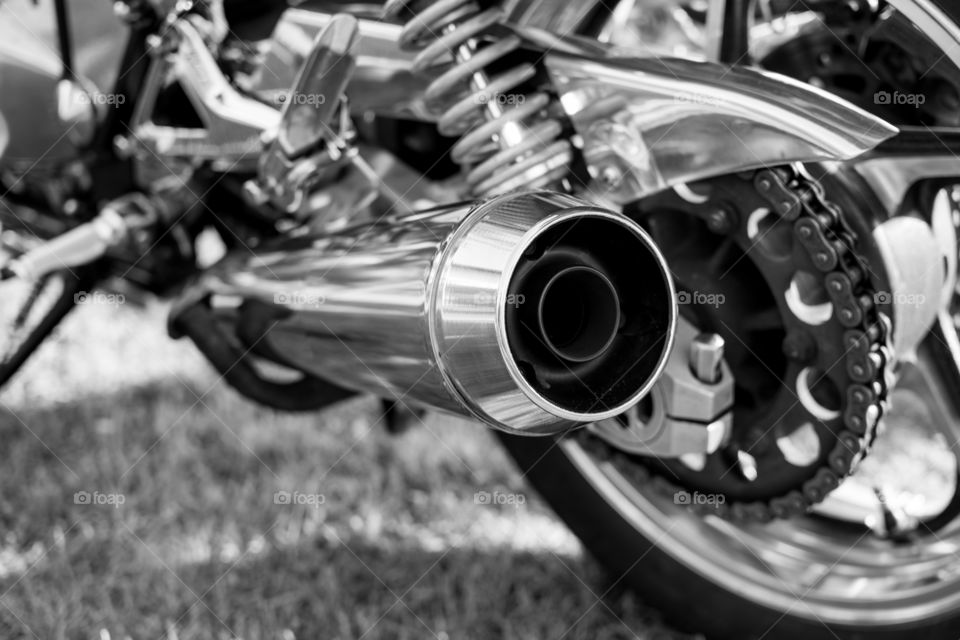 Chromed exhaust on a motorcycle. photoshoot of Kawasaki zephyr