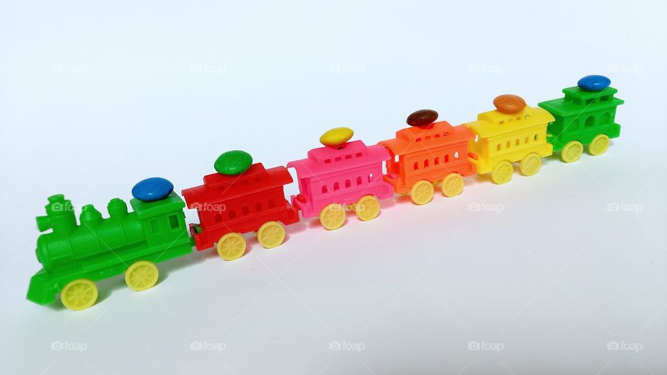 toy train carries colored dragee