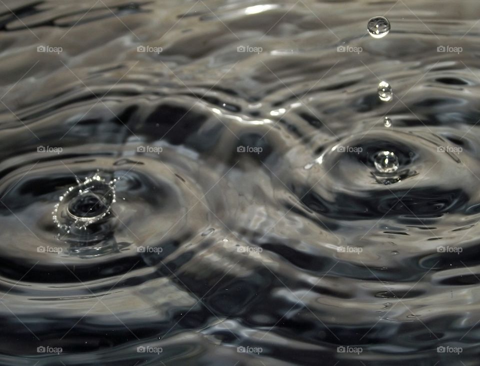 Drop with rippled water