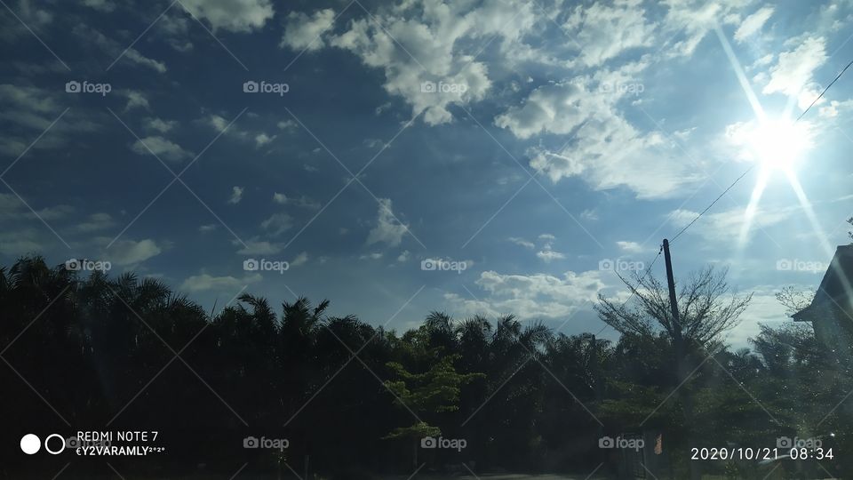 Sun Shining Through Cloud