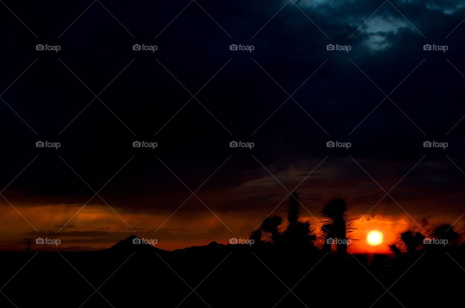 Stormy desert sunset