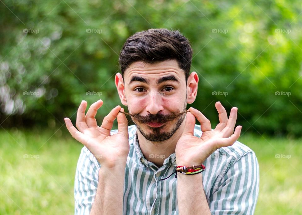 Portrait of Young Man With Big Mustache